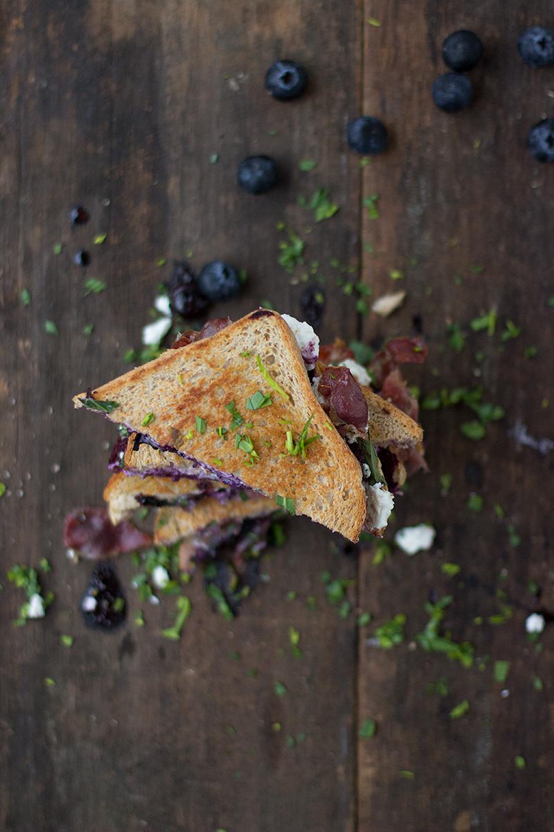 toastie w braised blueberries in balsamic, goats cheese,  prosciutto & rocket | jessica cox